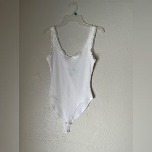 Women’s ribbed bodysuit with lace edges